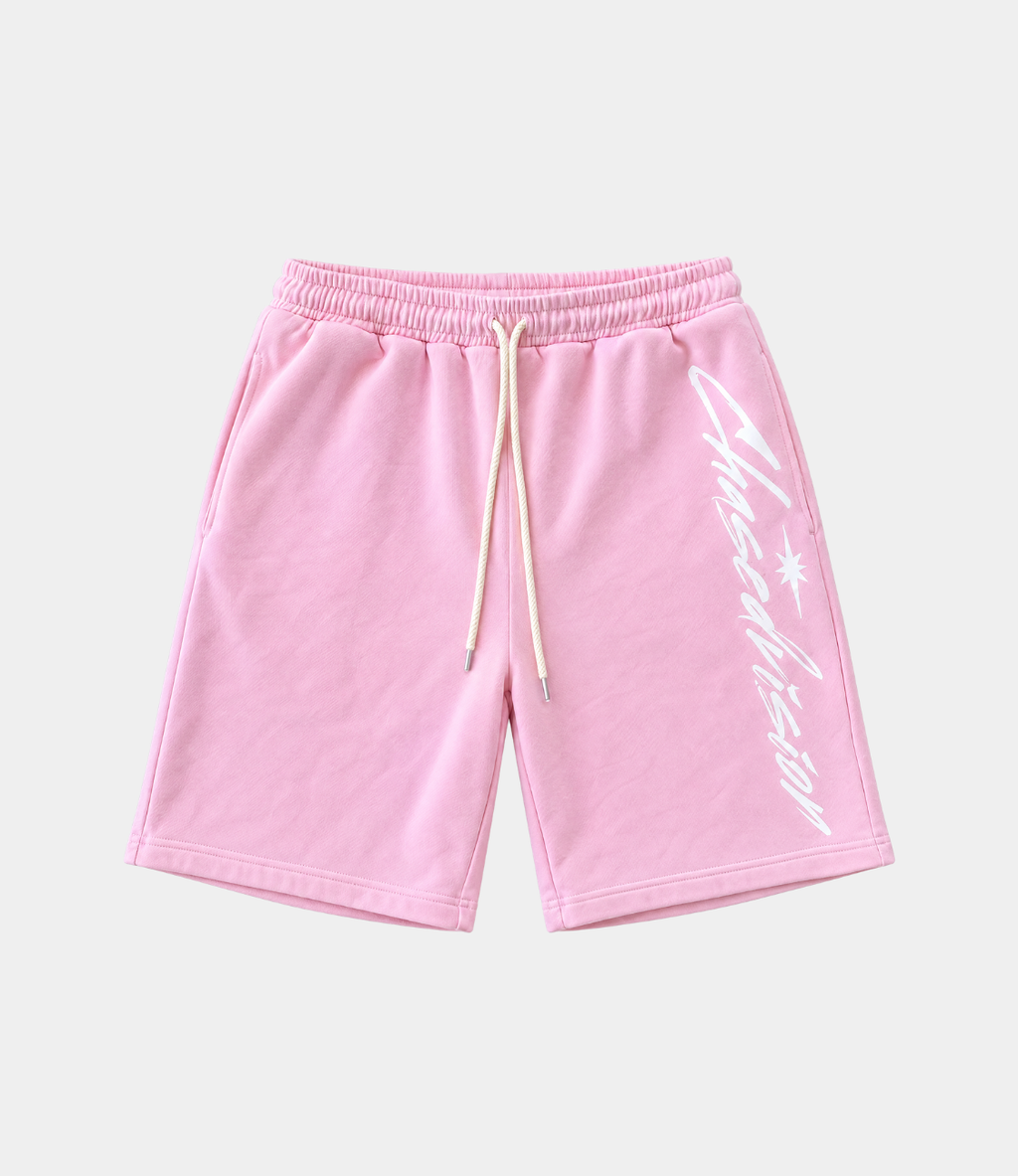 Pink shorts with a drawstring, ideal for summer outfits, paired beautifully with long sleeve tops or grey accessories.