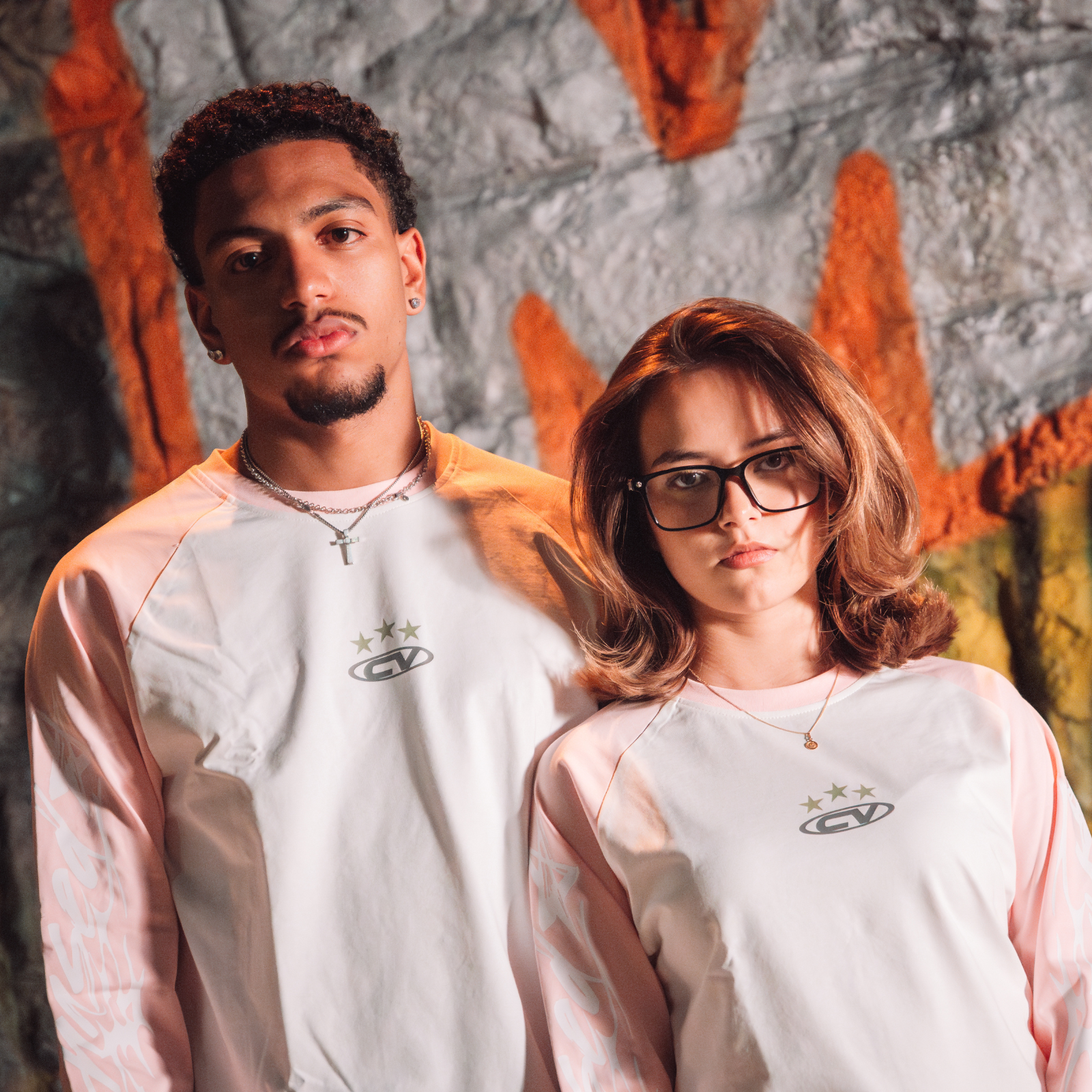 Young models in pink longsleeve shirts, perfect for summer wear with shorts, stylish and trendy look.