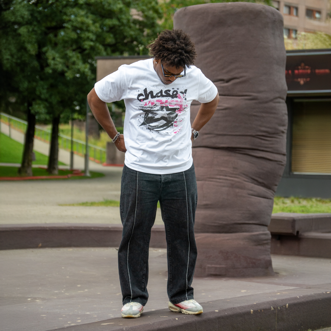 Man wearing the Pinkvision Tshirt by Chasedvision showcasing the perfect fit and high quality